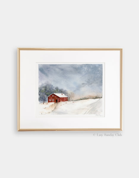 Gold framed mock up of singular red barn in snowy field with ominous gray clouds above watercolor landscape