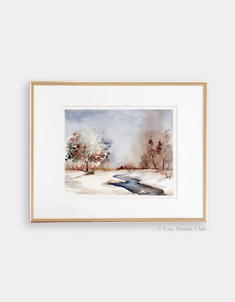 Gold framed mock up of Chilly frozen winter watercolor landscape featuring small stream in a park