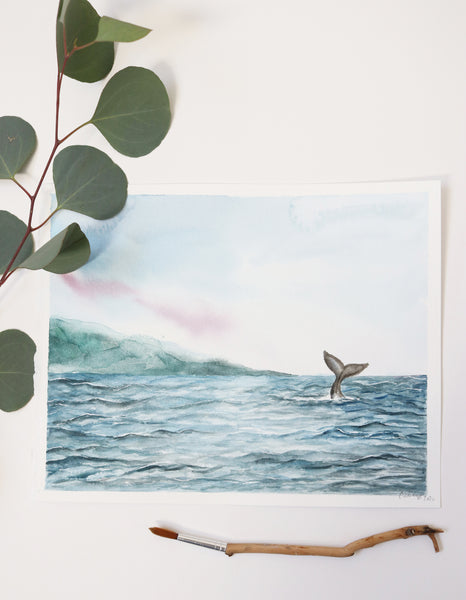 velvet blue ocean ripples and gray whale tail in distance watercolor landscape flat lay