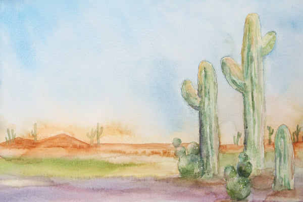 close up view of cactus watercolor in a desert landscape, desert themed art print with bright and saturated colors
